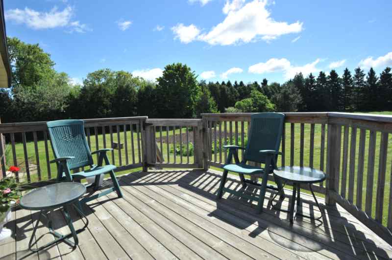Deck off of kitchen - overlooking 2.5 Private Acres