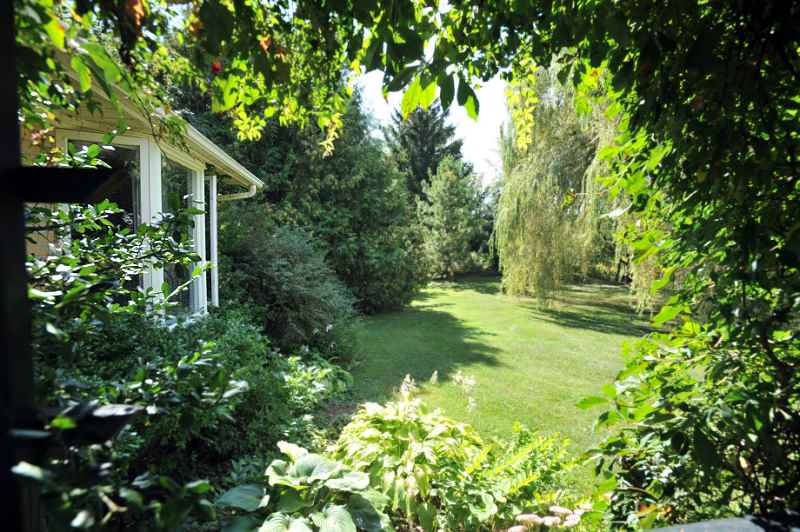 Property backs onto a ravine with a farm to the East  