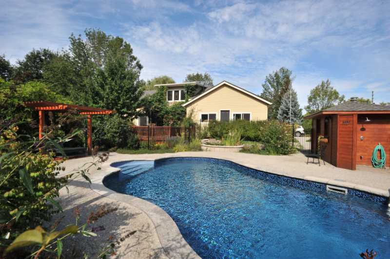 in-ground heated pool, ornamental pond & salt water hot tub