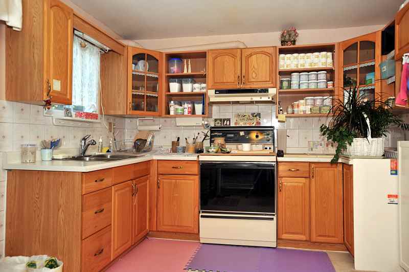 in-law suite kitchen, oak Cabinetry, lower level