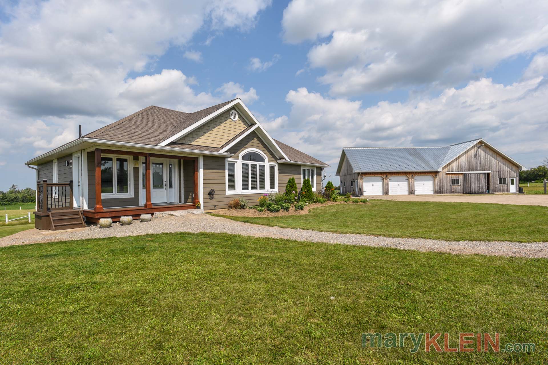 Newer Bungalow, 6 stall barn, workshop, 3 car garage 