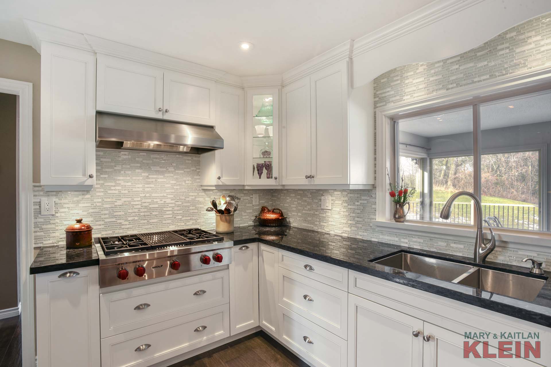 Gas Stovetop, glass backsplash