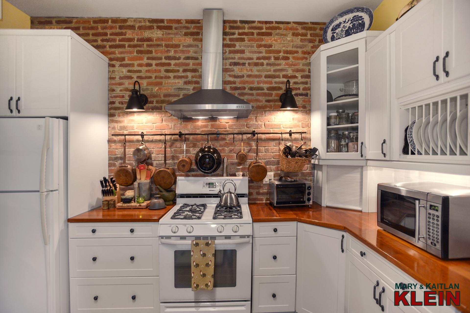 Kitchen, exposed brick wall