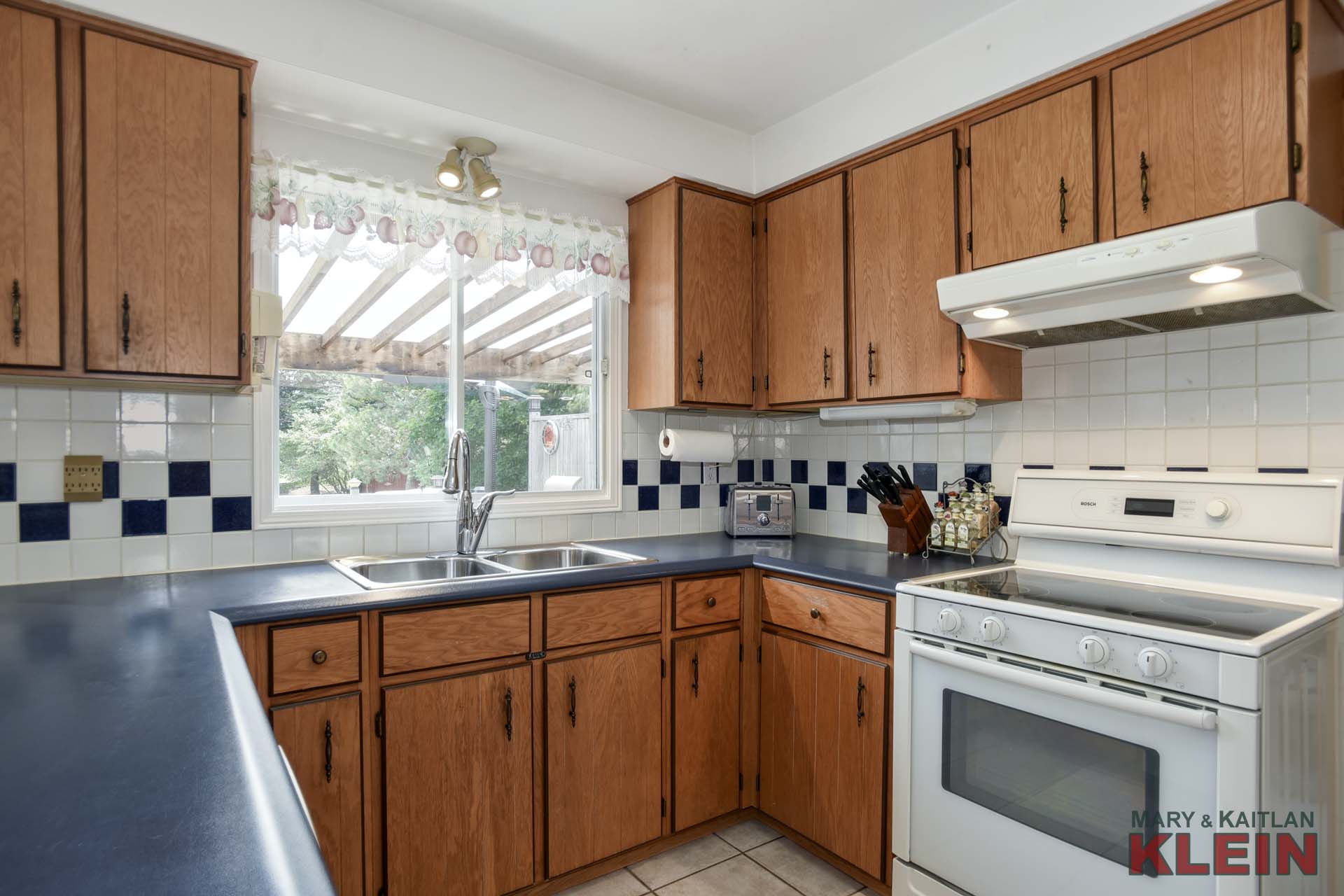 Kitchen overlooking backyard